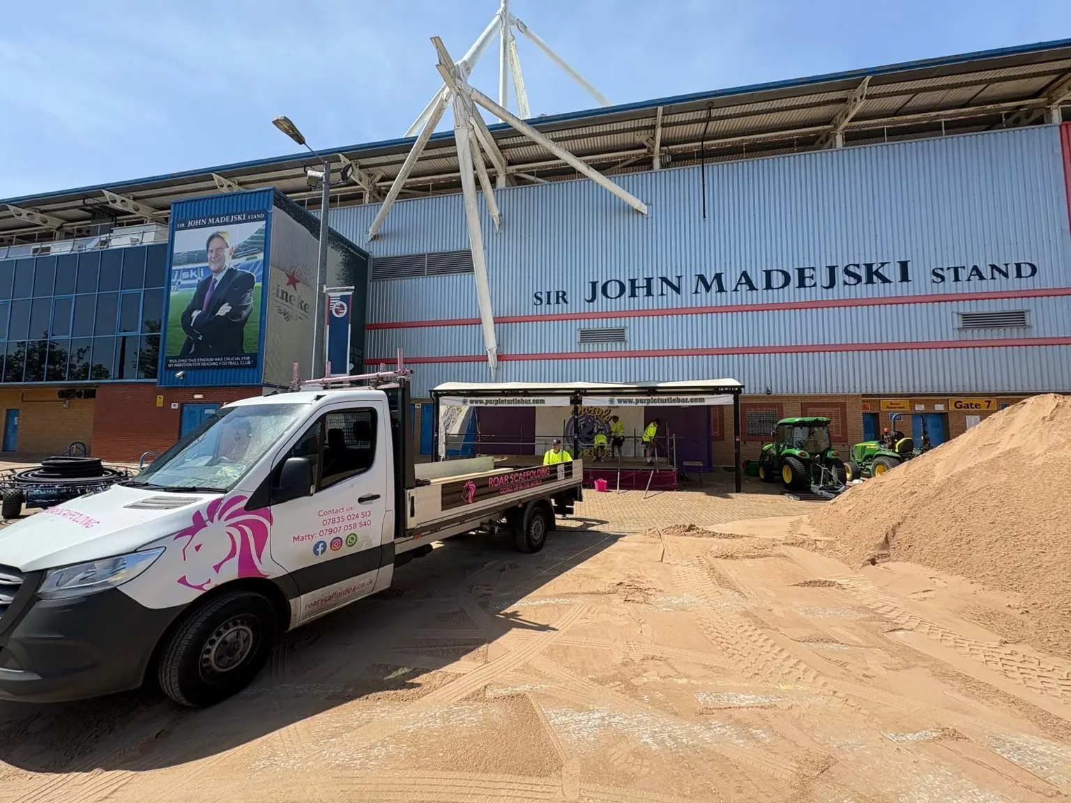 ROAR Scaffolding vehicle beside a temporary performance stage at the Sir John Madejski Stand in Reading