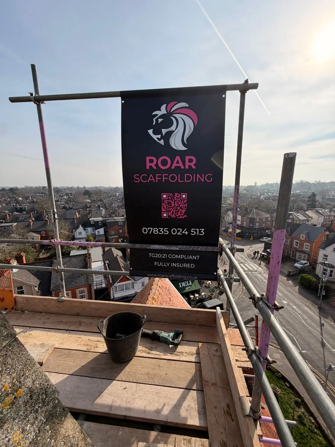 ROAR Scaffolding banner with a panoramic view across the Reading skyline