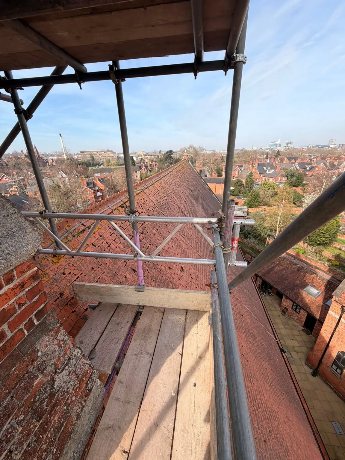 Panoramic view along the church roofline towards the Reading skyline