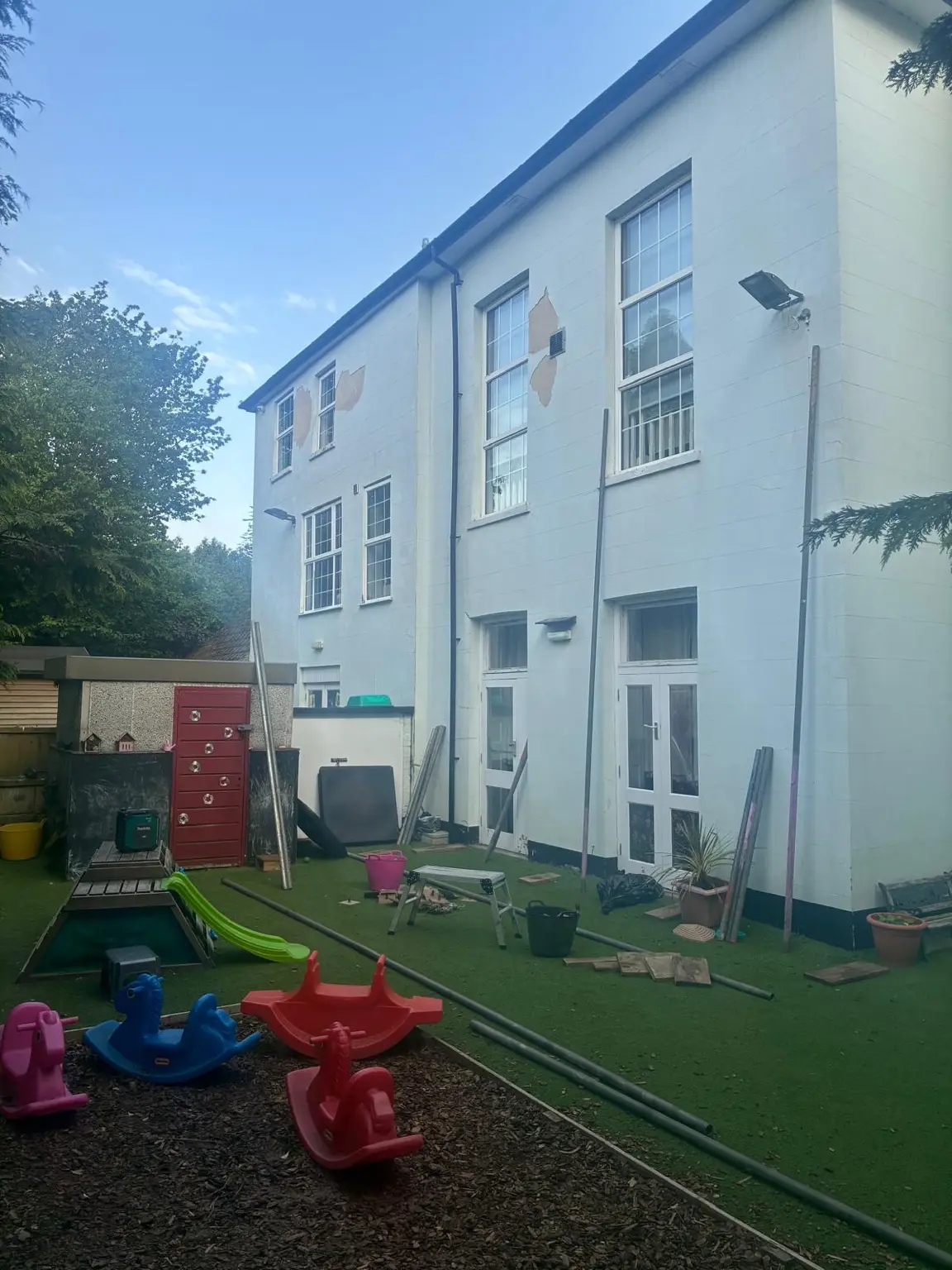 Nursery elevation and outdoor play area before the access scaffold was erected